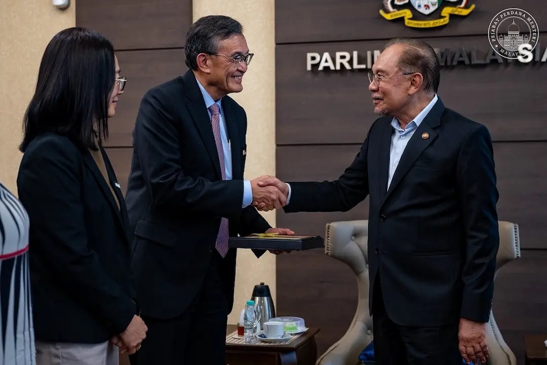 Datuk Seri Anwar Ibrahim greets Intel Corporation chief executive officer Lip-Bu Tan in Putrajaya Dec 1, 2025. (Photo via Facebook/Anwar Ibrahim)