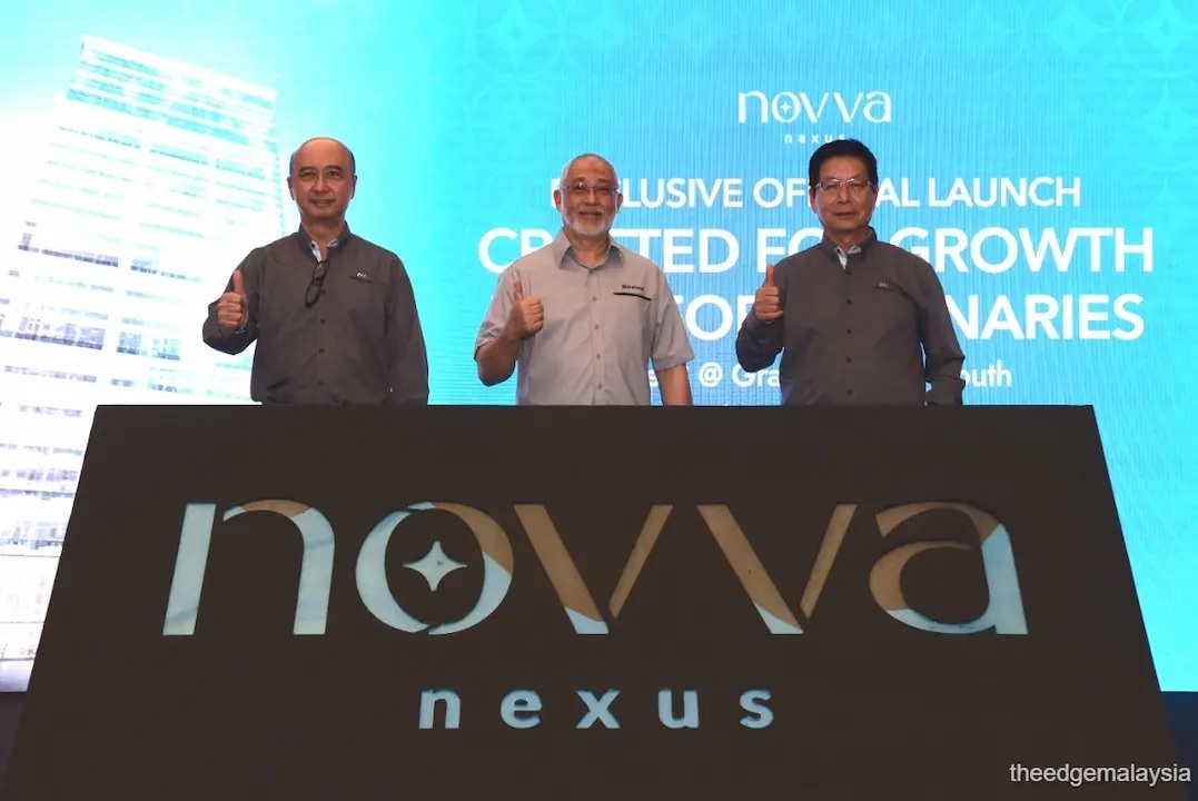 (From left) Mitraland group executive director Teo Ching Wee, chairman Datuk Johan Arifin and deputy executive chairman Chuah Theong Yee. (Photo by Patrick Goh/The Edge)