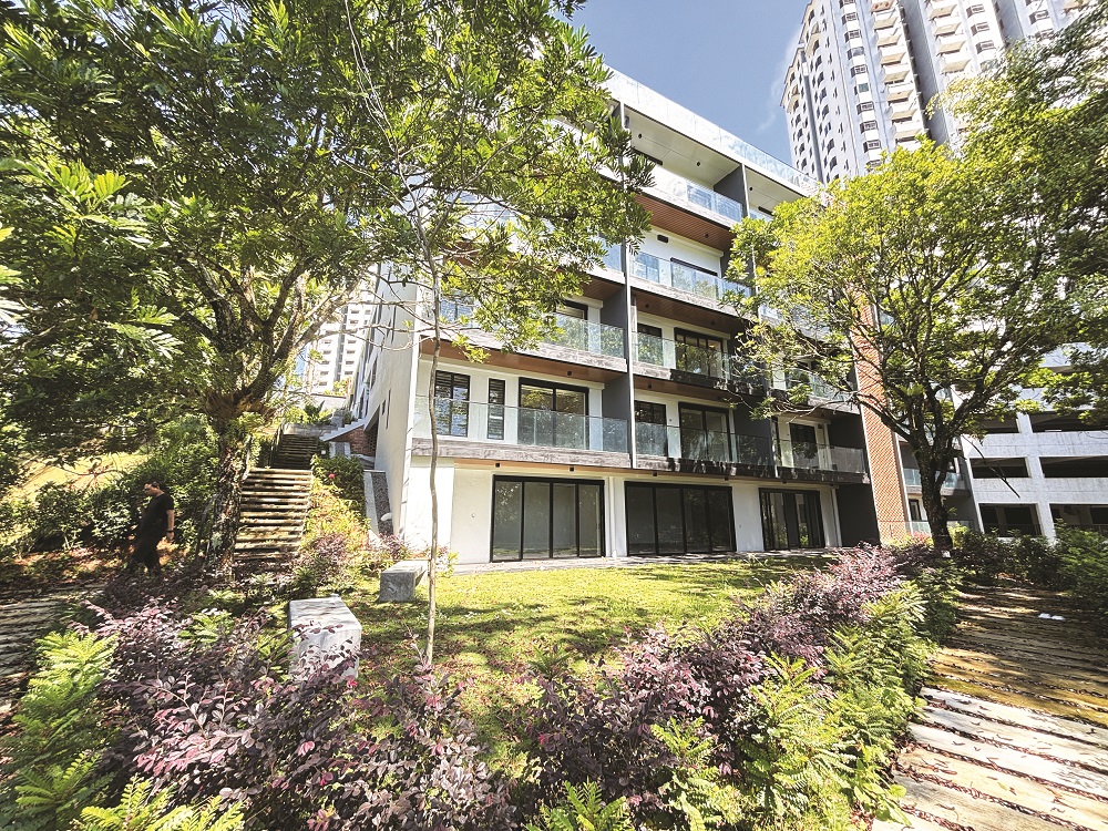 The newly-launched residential block overlooks landscaped greenery lining the pedestrian walkway.