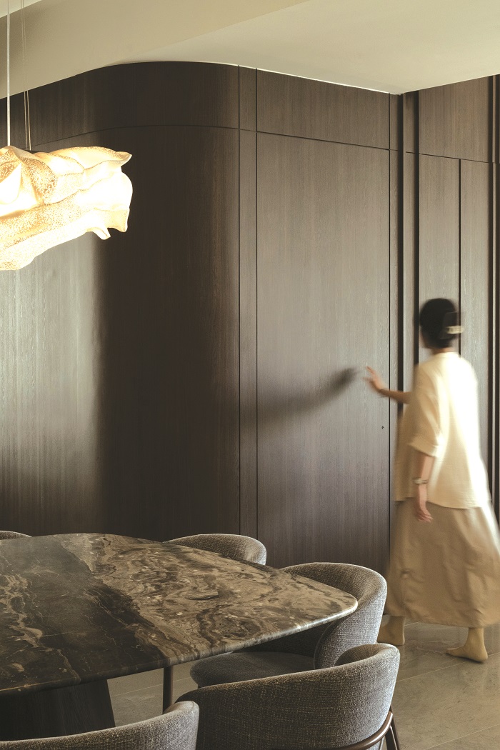 Going to the master bedroom: Hidden doorways and subtle transitions maintain clean lines throughout.