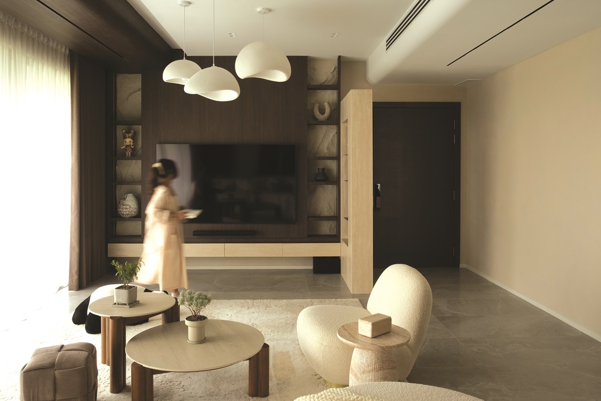 Living room: Minimalist lines and hidden electronics maintain a seamless, uncluttered aesthetics.