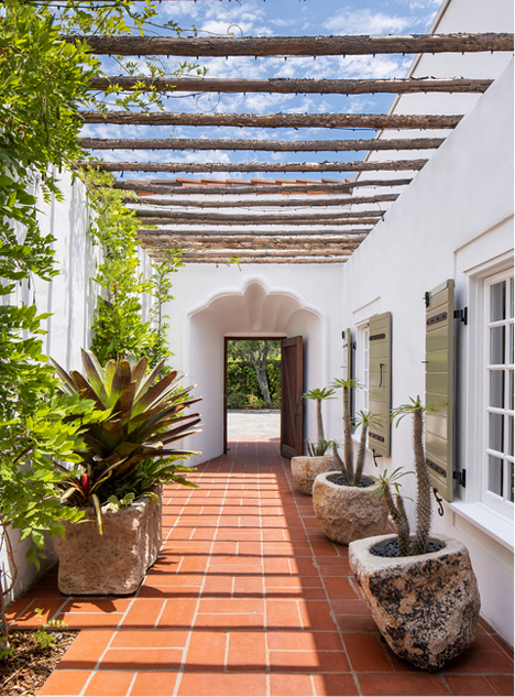 Wooden beams lend a rustic and vintage vibe to the Spanish-hacienda style. (Photographs by Redfin)