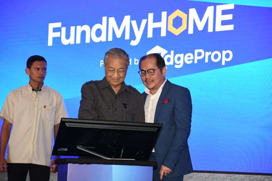 Prime Minister Tun Dr Mahathir Mohamad launches the innovative new property platform FundMyHome.com with The Edge Media Group Chairman Datuk Tong Kooi Ong. (Photos by Low Yen Yeing/EdgeProp.my)