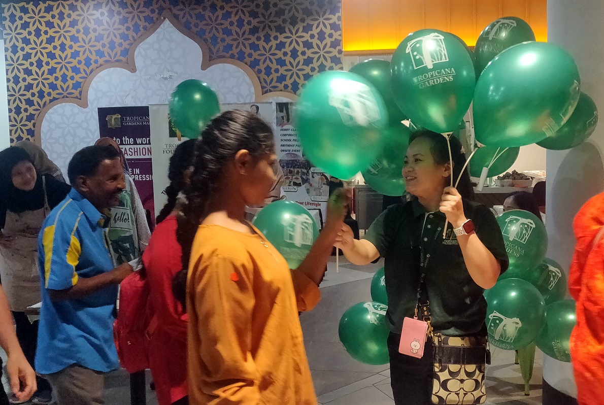 Tropicana Foundation members livened up the day with games and balloons