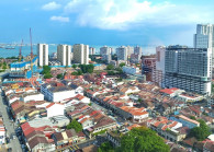 Penang’s shrinking divide is narrowing property price gap across strait