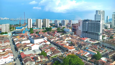 Penang’s shrinking divide is narrowing property price gap across strait